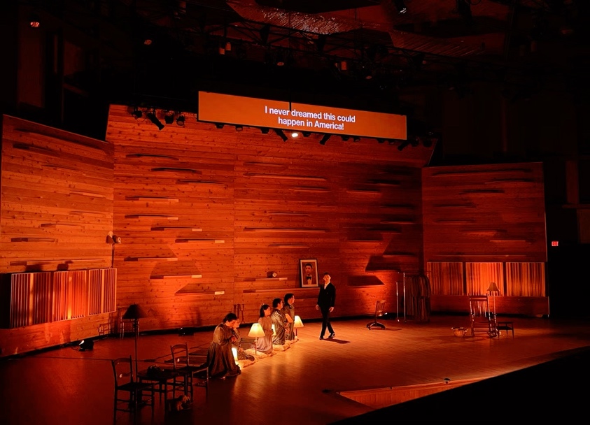 A group of people on a stageDescription automatically generated