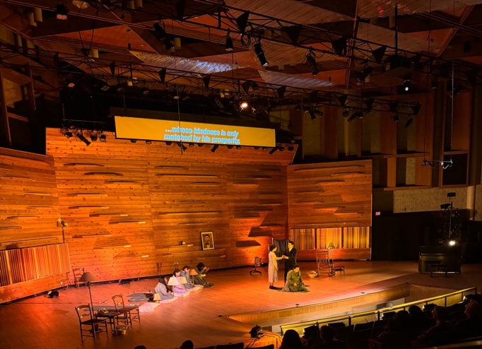 A stage with people on itDescription automatically generated